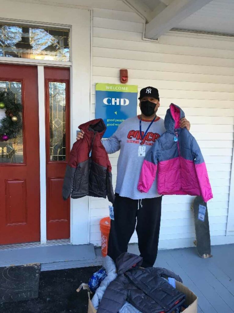 Stephen, Jessie’s House staff, receiving “Coats for Kids”